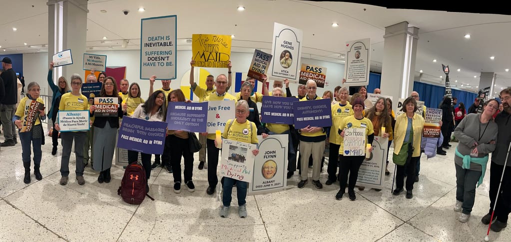 A group of supporters holding signs in New York