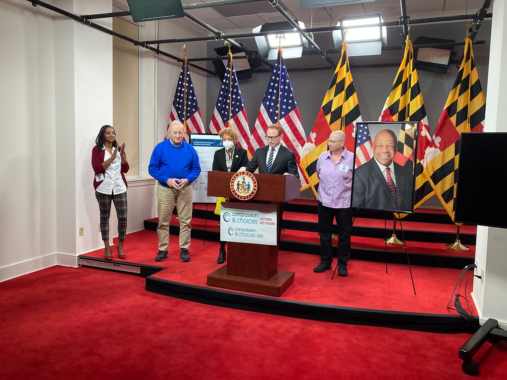 Brandi Alexander, Terry Lierman, Del. Terri Hill, Sen. Jeff Waldstreicher, and Diane Kraus speaking at Annapolis news conference in support of Maryland End-of-Life Option Act.