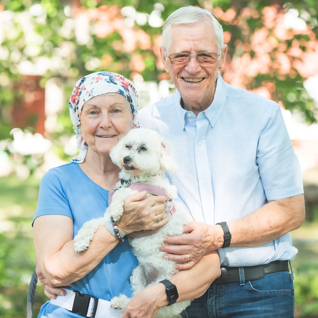 Nancy Uden with her husband and their dog
