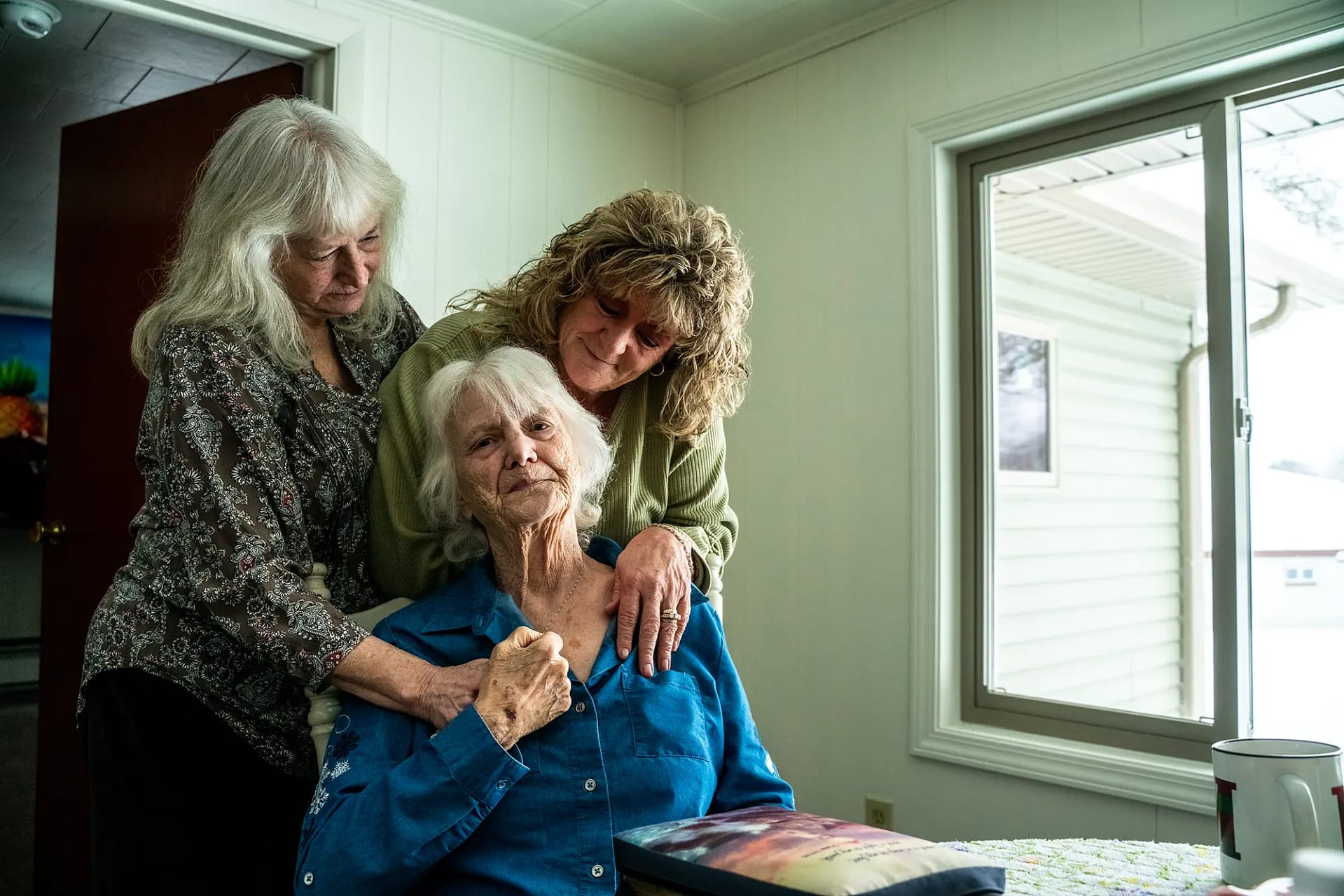 Marie Cooper pictured with her daughters