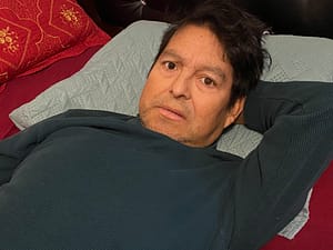 Don José Alejandro Lemuz resting on a pillow