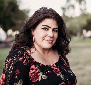 Headshot of Hanna Olivas taken outdoors