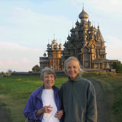 Marcia and Opal Sloane stand in front of the Kizhi Temple