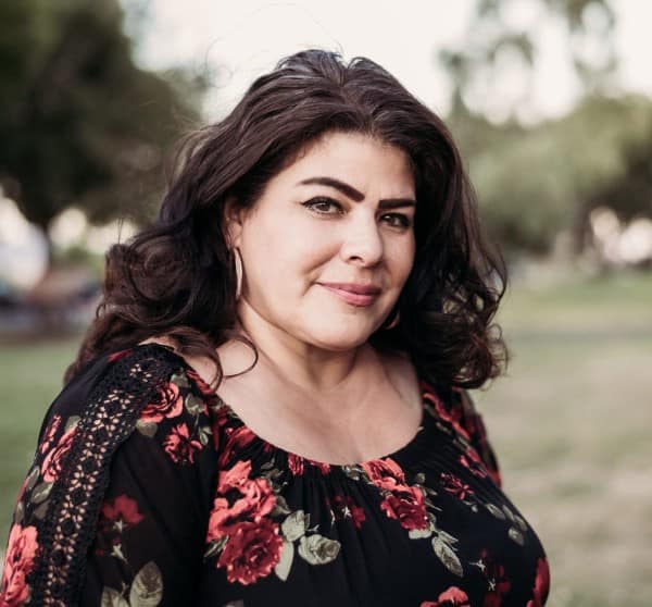 Headshot of Hanna Olivas taken outdoors