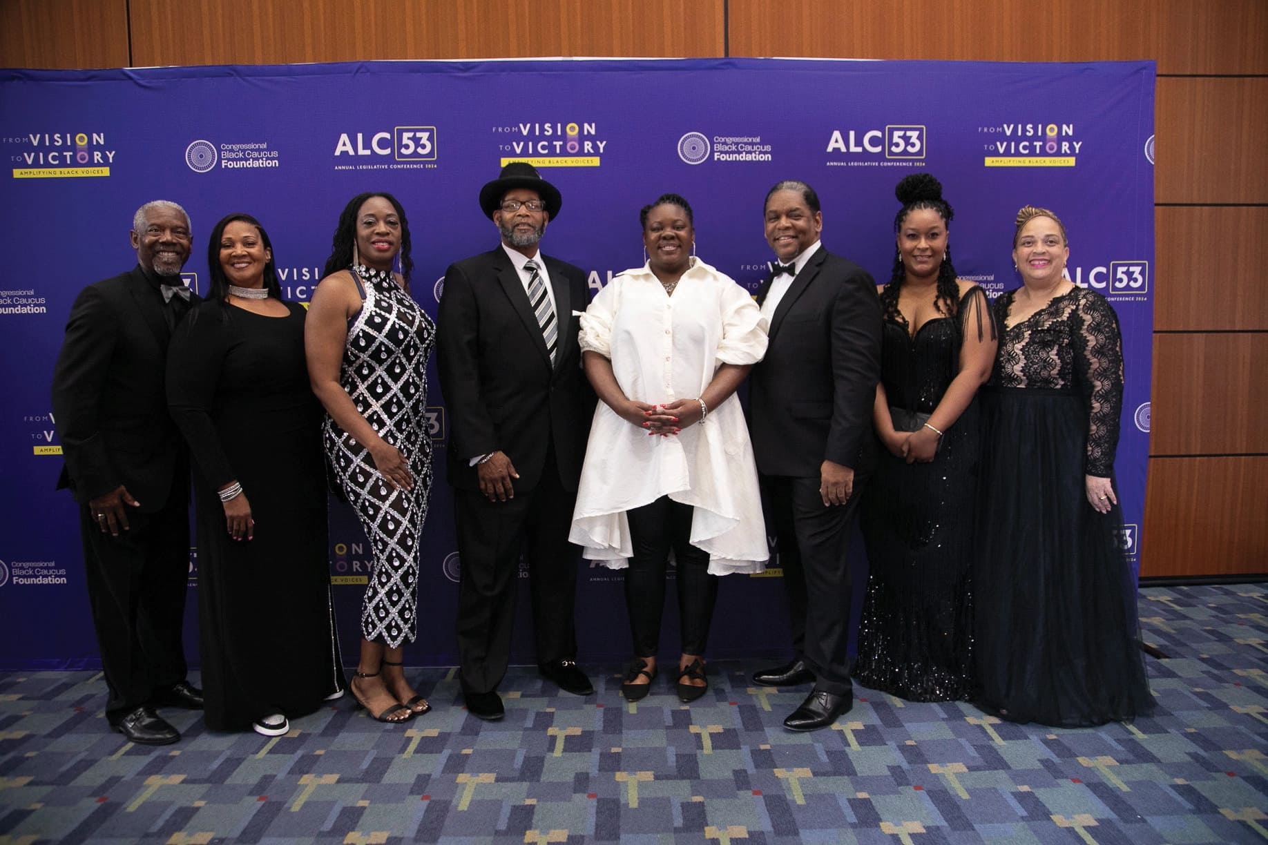 Compassion & Choices African American Leadership Council members and staff posing in front of a logo backdrop in Washington, D.C.